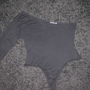 Black one long sleeve body suit. Size 14.